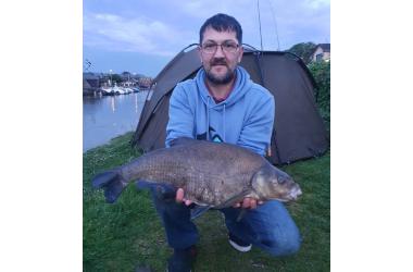 Jason Frayne holding large fish