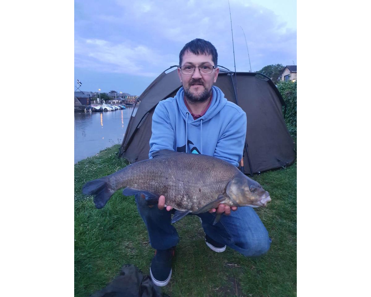 Jason Frayne holding large fish