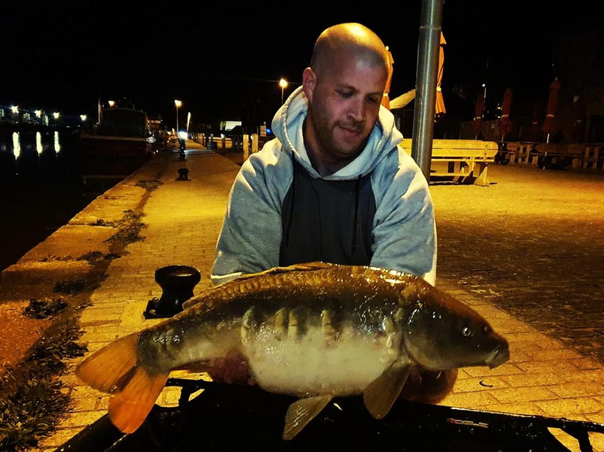 Scott Tremayne holding large fish